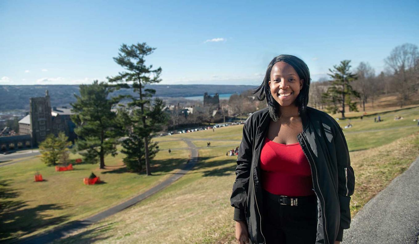 Grace on Libe Slope with a view of the lake beyond