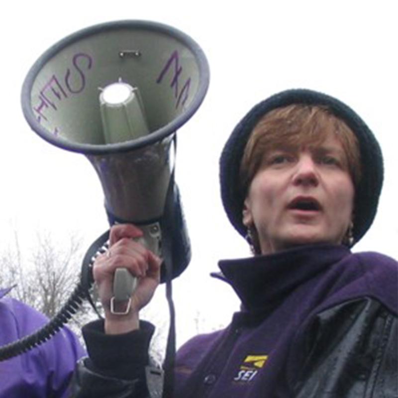 Kim Cook holding a megaphone