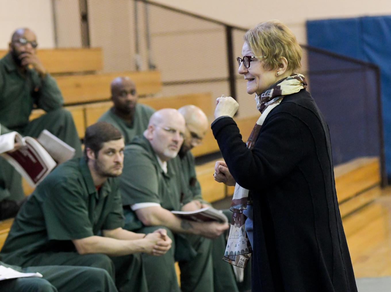 Esta Bigler teaching information on employment rights to participants at the Queensboro Correctional Facility