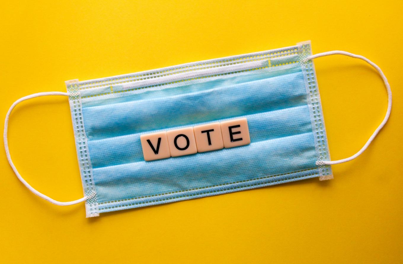 Vote written on surgical mask