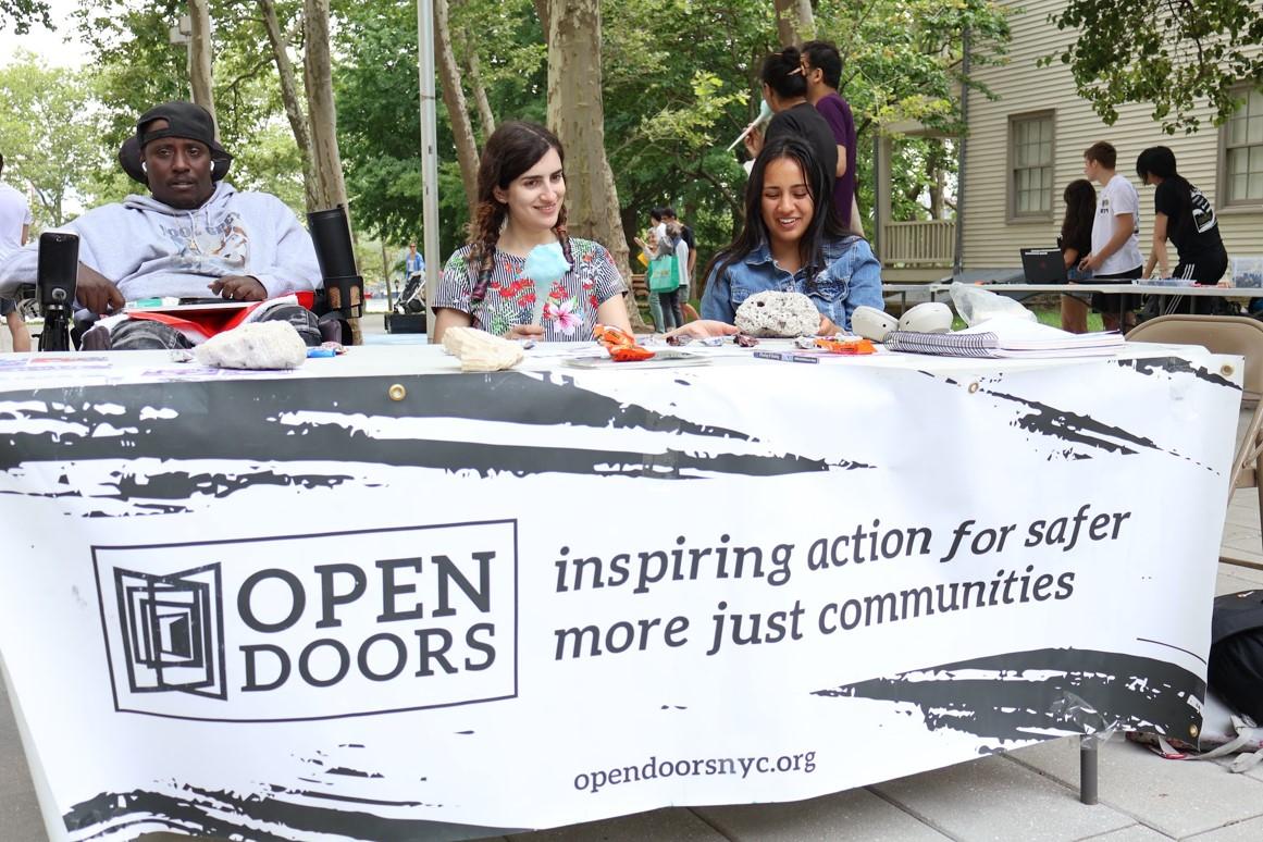 Student Arianna Josue with community members in NYC