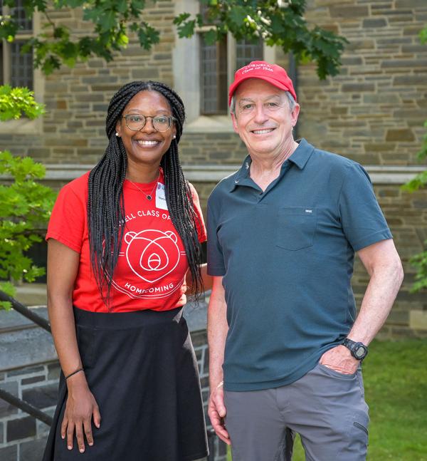 Ed Baum ’81 standing with an alum