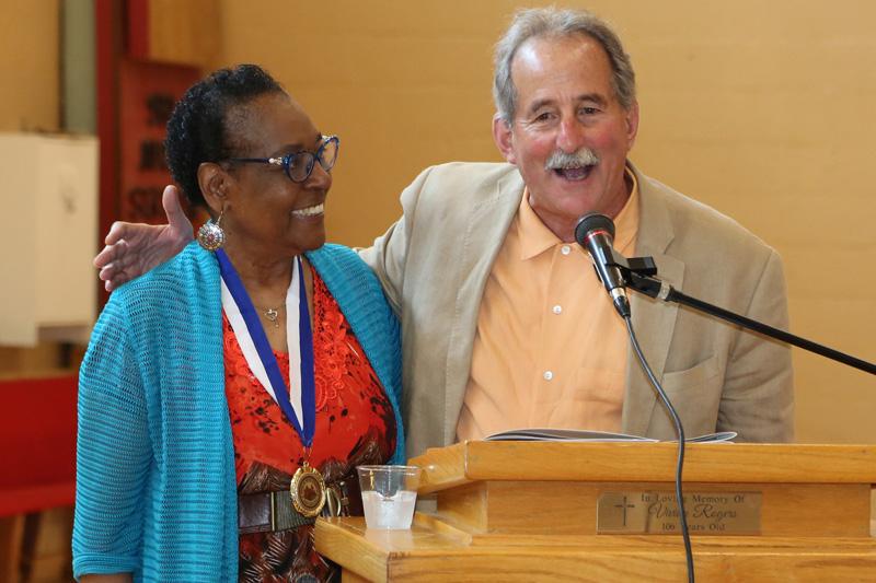 Lee Adler with a community organizer in West Virginia