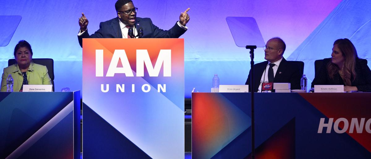 Speaker at podium at IAM convention