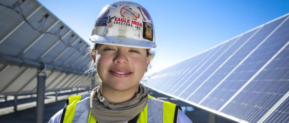 Photo of a solar worker