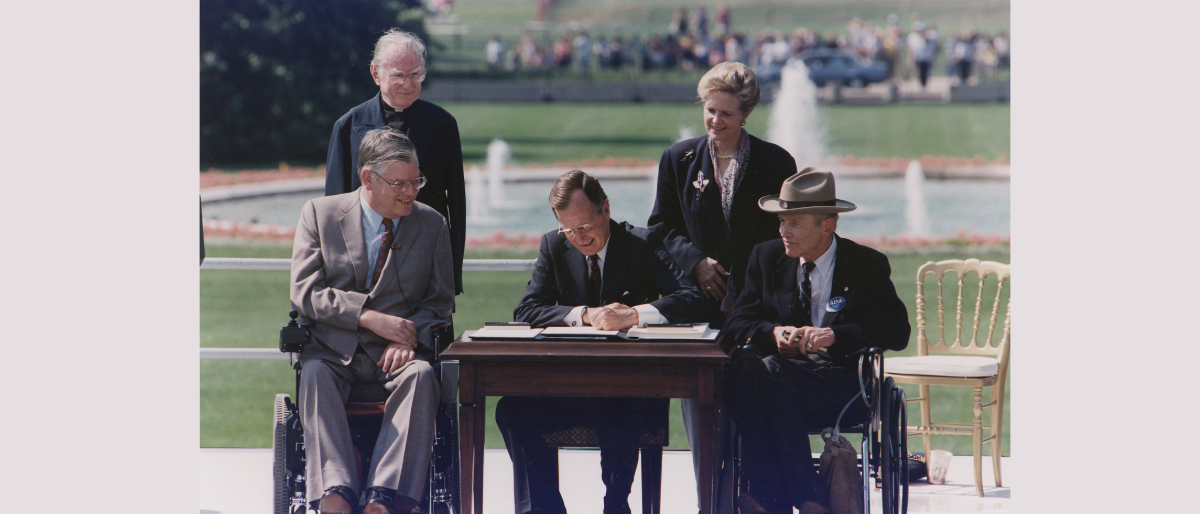 President Bush Signs into Law the Americans with Disabilities Act of 1990 on the South Lawn of the White House