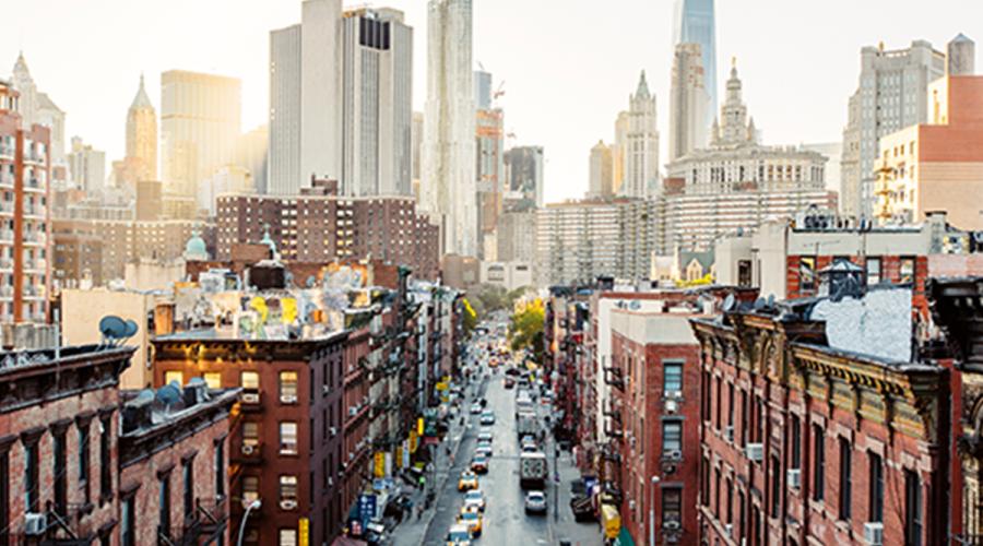 View of New York City with tall buildings in the background.