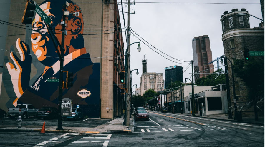 Mural of John Lewis on a street corner