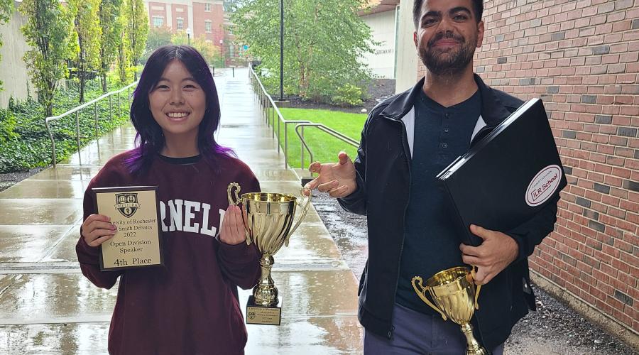 students pose with their trophies