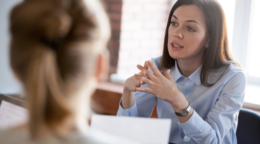 Woman negotiating with others