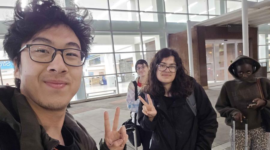 Students make the peace sign at Policy at Wake Forest event