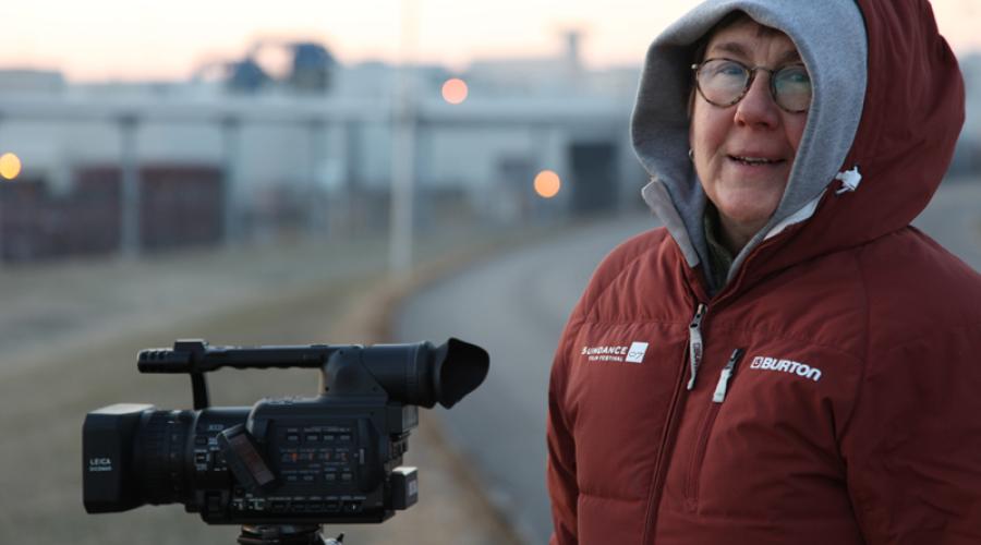 Academy Award-winning documentarian Julia Reichert filming in the cold.