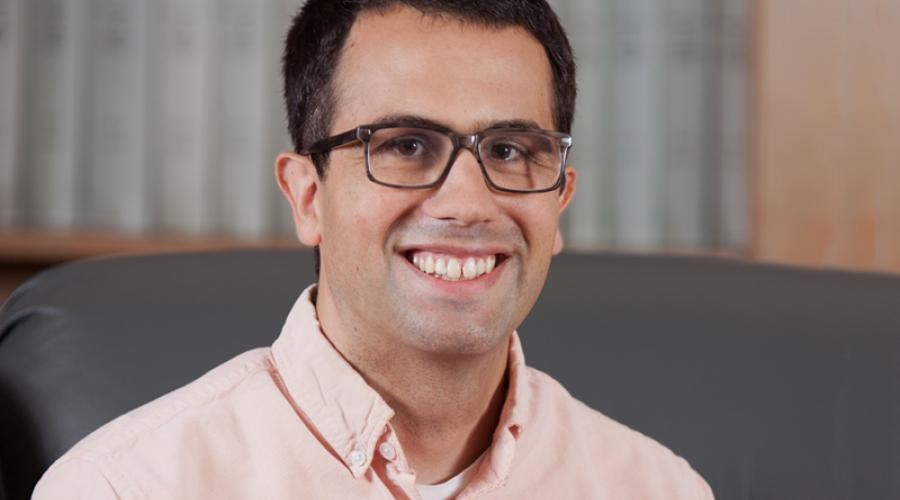 Assistant professor John McCarthy headshot in Dougherty Lounge