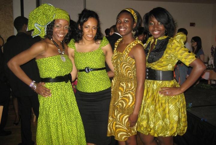 Melanie Stewart ’10 with friends in traditional culture clothing