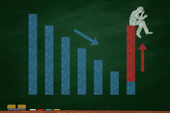 concept drawing of a negative rise bar graph with a person seated on the final bar, which is raised sharply up from the rest of the bars.