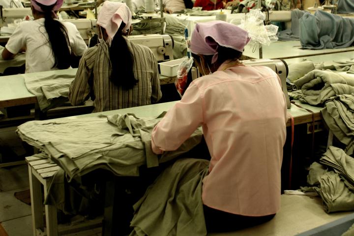 Garmet workers sewing in a factory