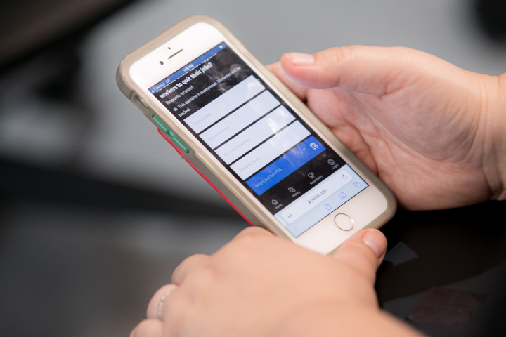 An individual using a cell phone
