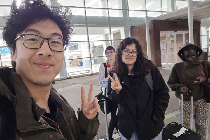 Students make the peace sign at Policy at Wake Forest event