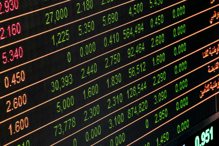 image of a stock board, like you may find on wall street.