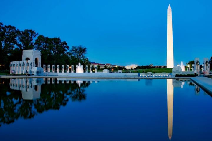 The Washington Monument reflected in the reflecting pool.